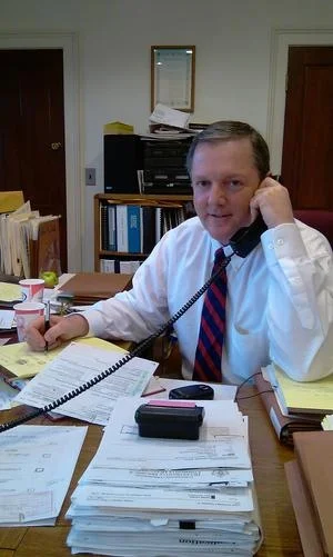 Attorney Francis T. Crimmins Jr. on the phone at his desk